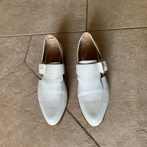 Zara white leather loafers with cutouts.
